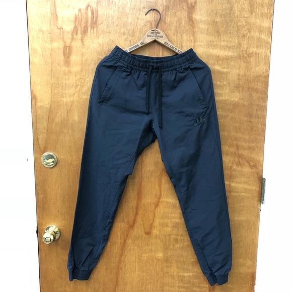 nike tech nylon pants